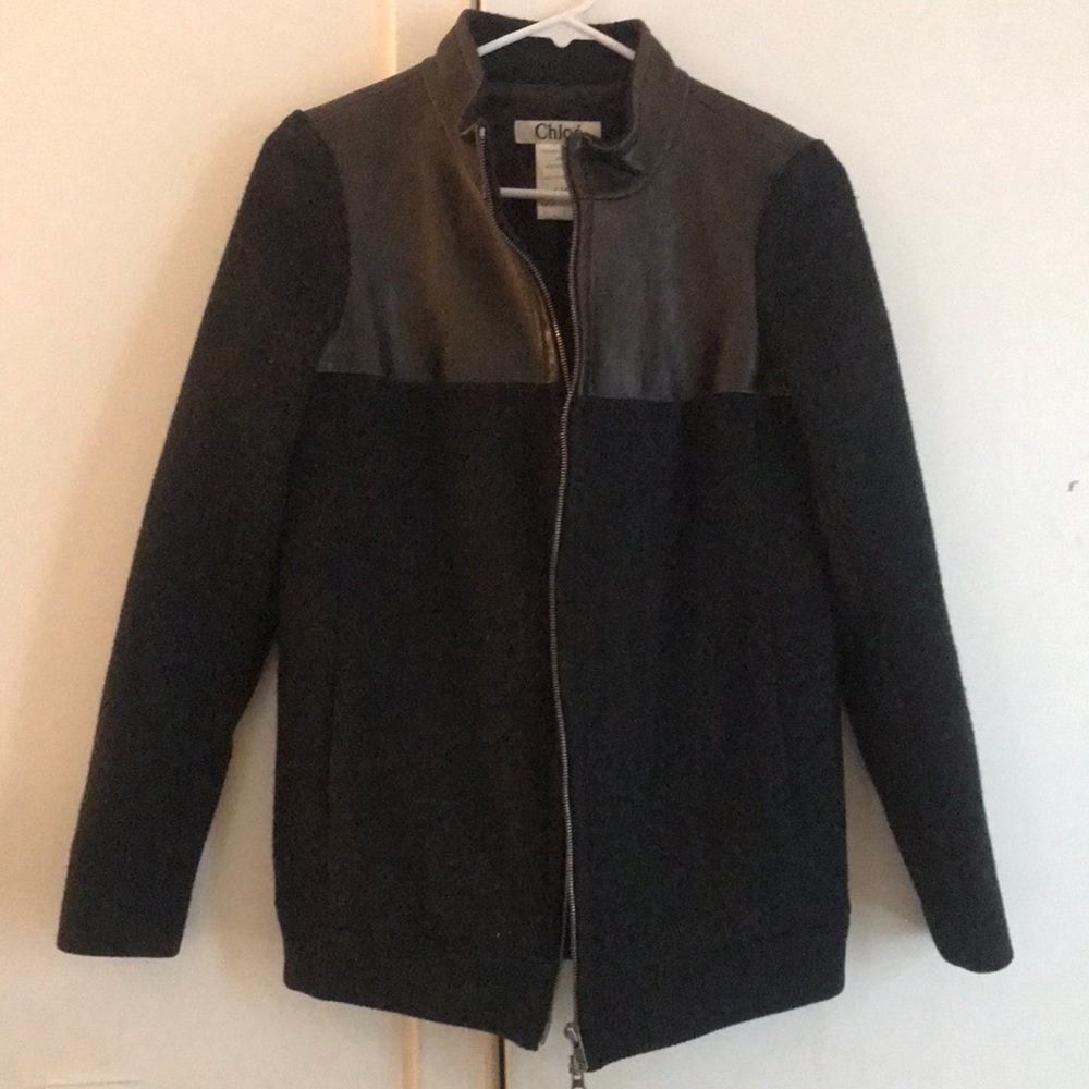Worn; decent condition only has a small hole on the right side